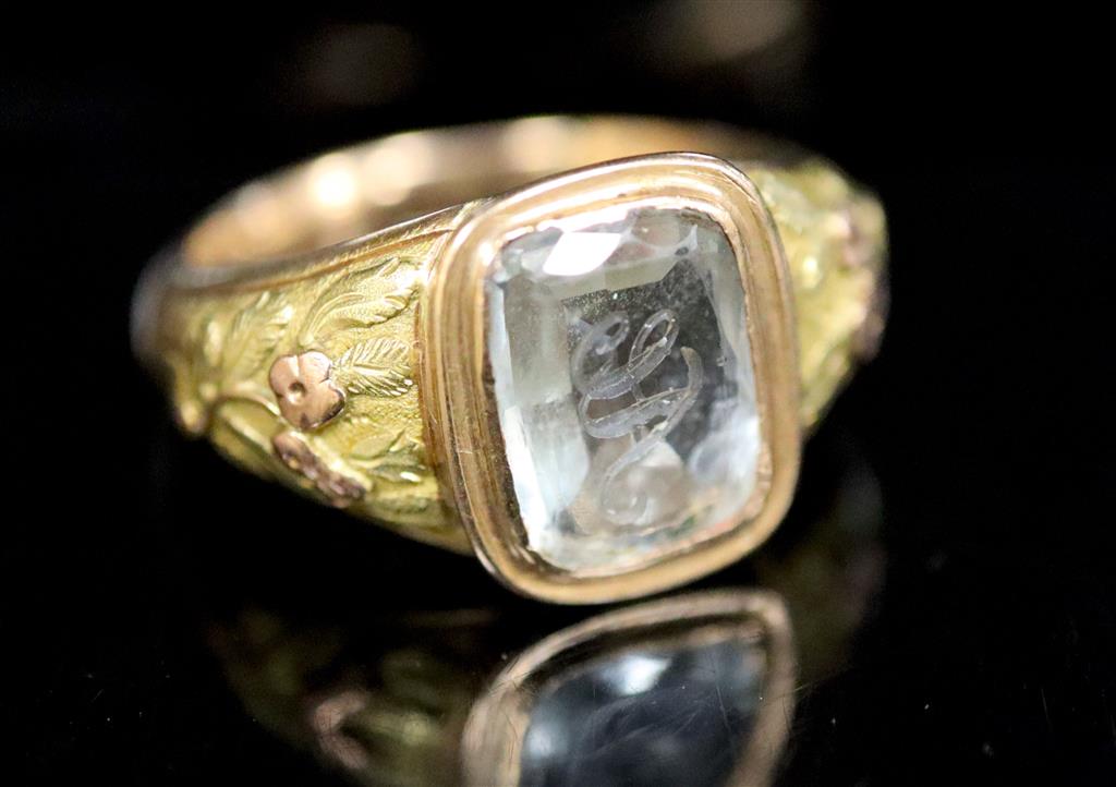 A William IV two colour gold and JA monogrammed aquamarine set ring,